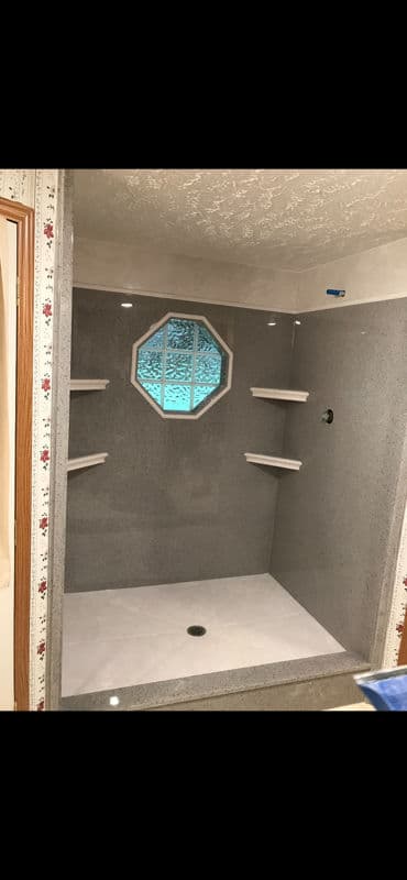 Sleek Shower Upgrade with Cultured Marble